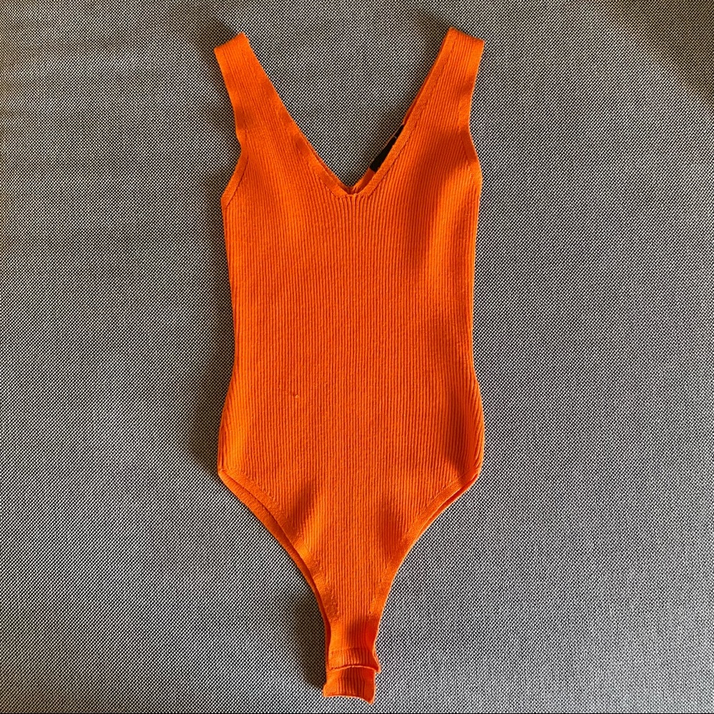 orange bodysuit
